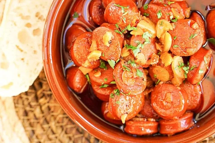 How to Make Spanish Chistorra a la Sidra with Sweet and Spicy Notes