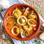 Traditional Spanish Seafood Soup with Fresh Herbs